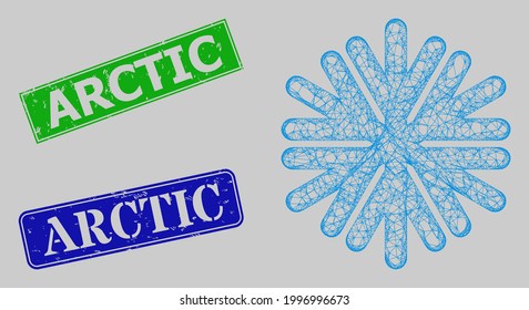 Modelo de copo de nieve de malla neta de la canal y estampillas rectangulares azul y verde del Ártico. La imagen de malla neta de la canal se basa en un icono de copo de nieve. Los sellos contienen texto ártico en forma rectangular.