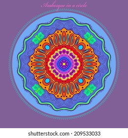 Card with arabesque on a blue circle and pink text on a frame.