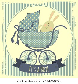 Card with a baby carriage. It's a boy!