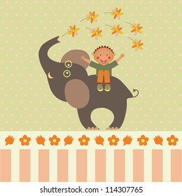 card with boy on elephant with flowers