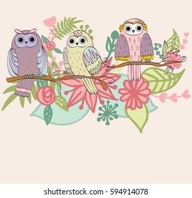 Card with cartoon owls in bright colors.