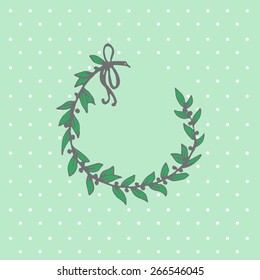 Card with a circle of branches. Light green background with white dots.