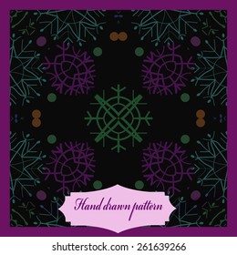 Card with circular pattern of colored snowflakes, label.  Hand drawn. 