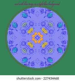 Card with circular pattern of floral motif and twigs on a blue circle and text. Handmade.