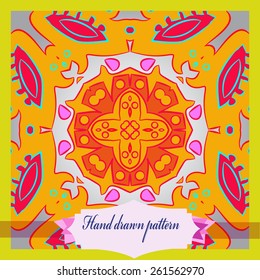 Card with colored circular pattern of floral motif, label. Hand drawn.