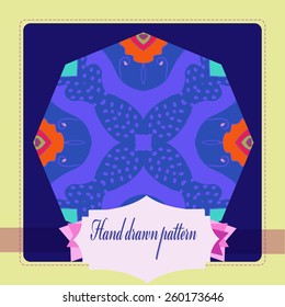 Card of  colored floral motif on a rounded rectangle, label. Hand drawn.