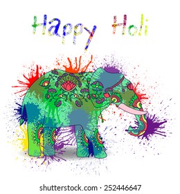 Card with colorful elephant and splatter. Holi festival of colors.