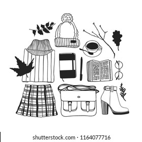 Card with cozy things. Hand drawn Autumn illustrations. Creative ink art work. Actual vector Fall Drawing jumper, skirt, hat, sketchbook, pen, bag, book, coffee, glasses, boot, twig, leaves