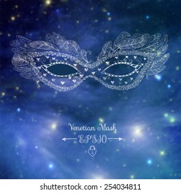 Card with festive venetian mask. Elements of this image furnished by NASA.