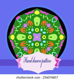 Card with floral circular pattern,  blue  frame, tulip, label on a black    circle. Hand drawn.