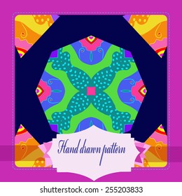 Card with floral circular pattern, frame, label   on a dark blue     background. Hand drawn.