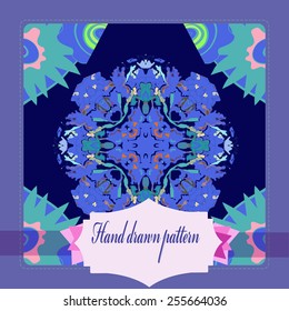 Card with floral circular pattern,  frame, label   on a  dark blue    background. Hand drawn.