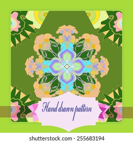 Card with floral circular pattern   frame, label    on a  pale green     background. Hand drawn.