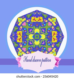 Card with floral circular pattern, light blue   frame, label on a  white   circle. Hand drawn.