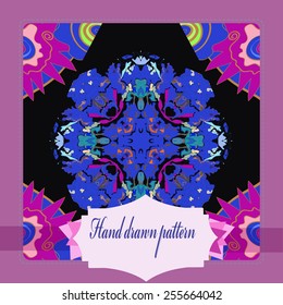 Card with floral circular pattern, pale pink   frame, label   on a  black    background. Hand drawn.