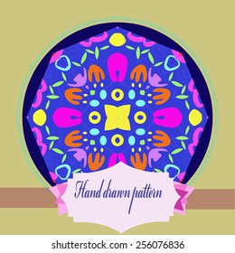 Card with floral circular pattern, pale yellow   frame, tulips, label on a  dark blue   circle. Hand drawn.