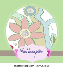 Card of floral colored motif on a circle, label. Hand drawn.