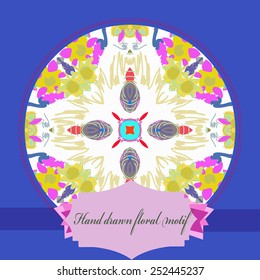 Card with hand drawn floral motif, star, label on a  white  background and  blue frame.