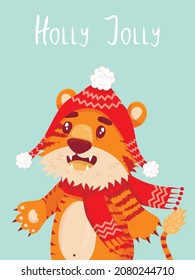 card with the inscription Holly Jolie with a cute tiger, the symbol of the Chinese new year. flat style. Tiger in a New Year's hat and a red scarf rejoices, laughs, smiles