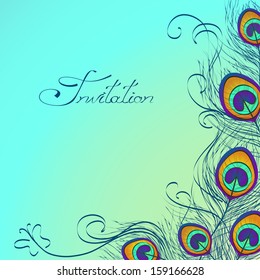 Card or invitation with iridescent peacock feathers decoration on blue background