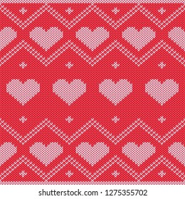 Card with knitted seamless abstract background with hearts.