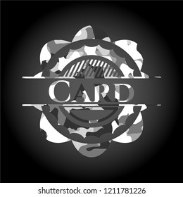 Card on grey camouflage pattern