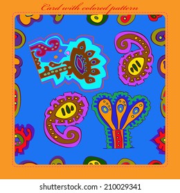 Card with  pattern of colored plants, floral motifs on a blue rounded rectangle and red text on an orange frame. Handmade.