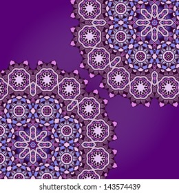 Card with round floral patterns on violet background.