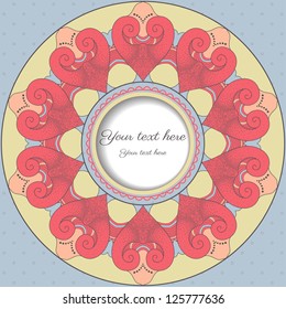 Card with round frame. Filigree lace pattern reminiscent hearts.