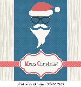 Card with Santa Claus on the wood background