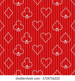 Card suit seamless pattern on red background.