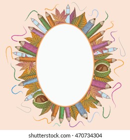 Card template.Vector oval-shaped frame with with pen, pencils, autumn leaves and chestnuts