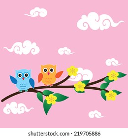 Card with two owls on branch at day