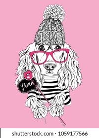 Card of a Valentine's Day. Cocker Spaniel Dog in a striped cardigan, in a knitted cap and with a Photo Booth Props. Vector illustration.