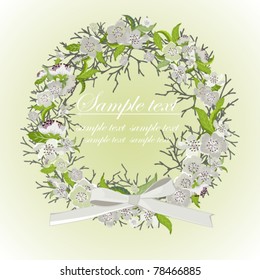 Card with a wreath about white flowers branches and a bow