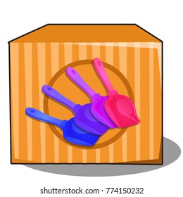 Cardboard box with colored plastic shovels for snow isolated on white background. Vector cartoon close-up illustration.