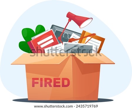 Cardboard box with office items and labeled fired, concept of employee termination, job loss