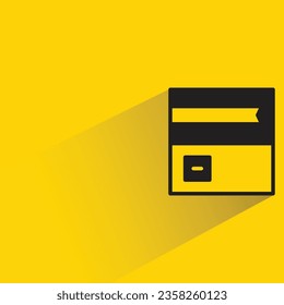 cardboard box with shadow on yellow background