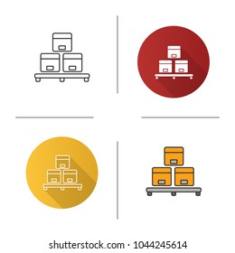 Cardboard boxes on pallet icon. Flat design, linear and color styles. Warehouse. Parcels storage. Isolated vector illustrations