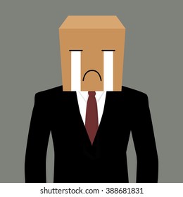 Cardboard businessman with a crying face. Business concept