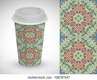 Cardboard cup of coffee with colorful ornament and hand drawn seamless pattern. Vector take away coffee packaging template, isolated design element for coffee shop. Business coffee break concept