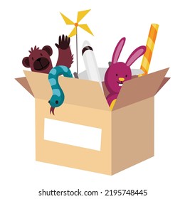 Cardboard donation box full of toys and devices. Charity and donate for poor people, help homeless and support needy. Volunteering, social care charity concept. Needed items