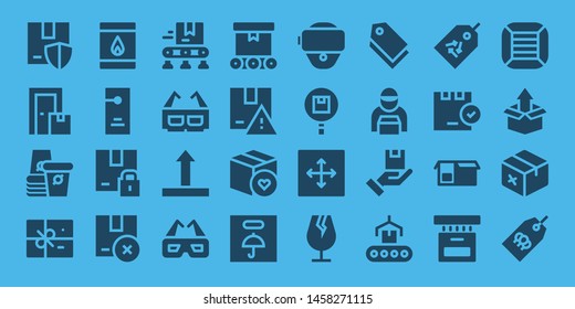 cardboard icon set. 32 filled cardboard icons. on blue background style Collection Of - Package, Box, Paper cup, Matchbox, Door hanger, Conveyor, 3d glasses, Side up, Fragile