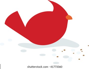 cardinal eating in snow