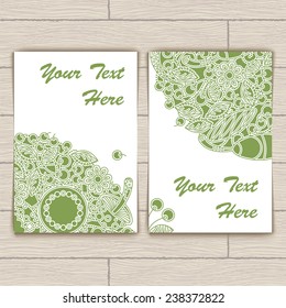 Cards with green round floral pattern and berries