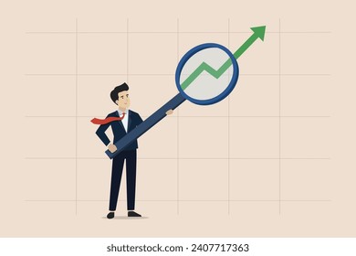 Career growth or performance to achieve success, smart businessman analyzing graph improvement using magnifying glass.