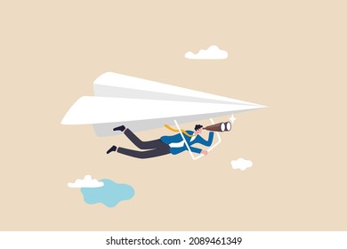 Career opportunity, investment or business vision, future forecast or discover new idea and inspiration concept, businessman flying paper airplane origami as glider with binoculars to see opportunity.