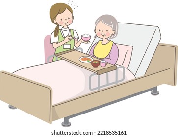 Caregiver assisting a senior woman with meals