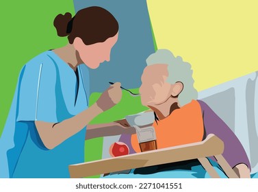 A caregiver is feeding an old woman in her bed. Professional workers in the health and social sector