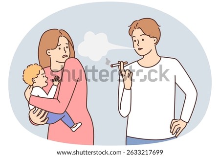 Careless man smoking cigarettes standing next to woman with infant in arms. Shocked girl tries to hide baby from cigarette smoke while walking near smoking passerby